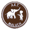 Brązowa plakietka w kształcie koła. Wewnątrz znajdują się białe sylwetki słonia (po lewej) i chłopca (po prawej). Nad postaciami znajduje się napis "A. K. T.", a pod nimi napis "MALUCH".